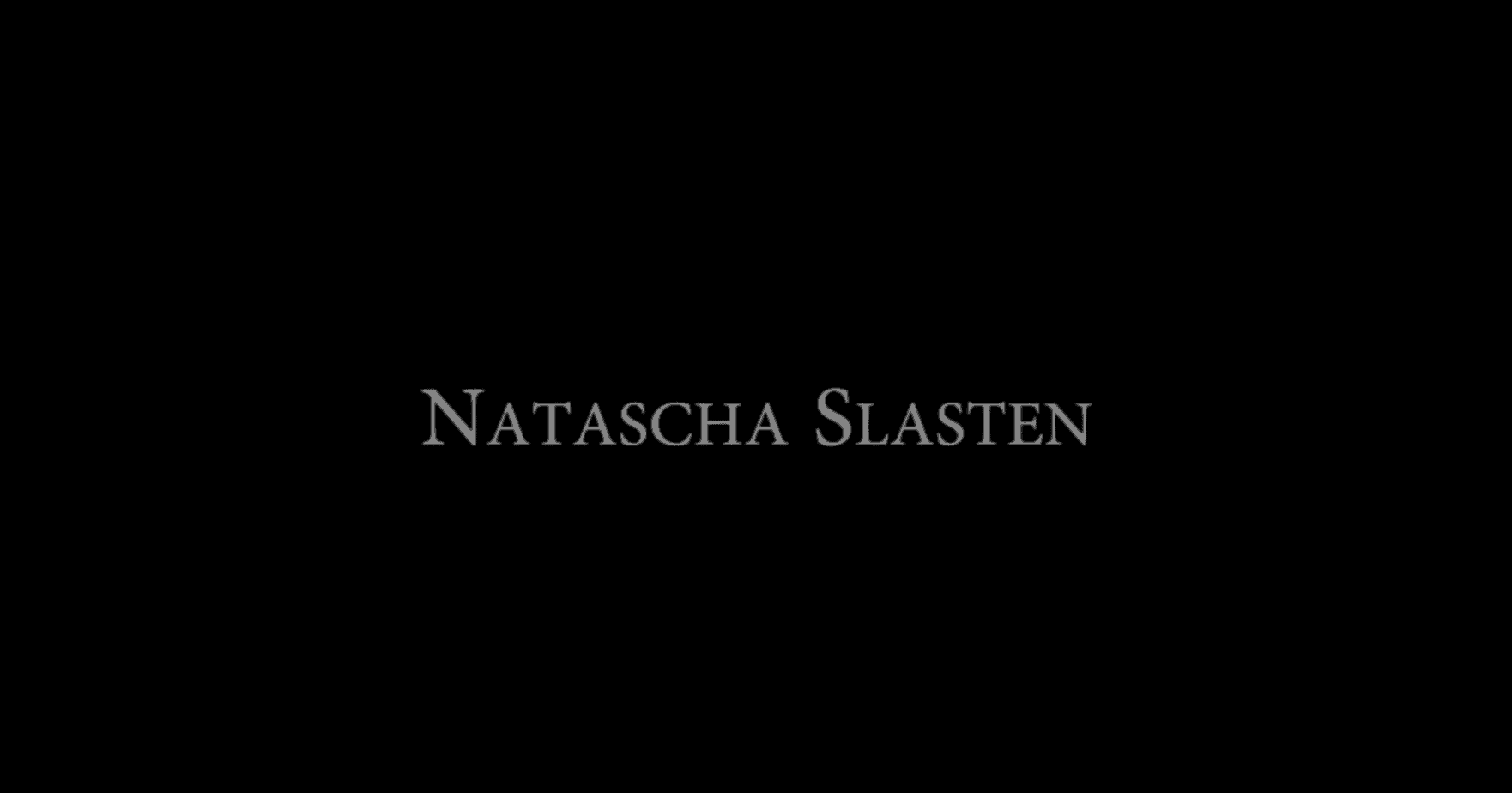 The words Natascha Slasten on a black background